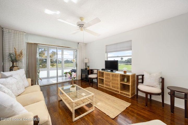 Corner water and golf views IMPACT lanai newer floors prime location!