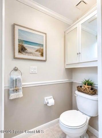 main floor 1/2 bathroom virtually staged