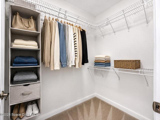 Master suite walk in closet virtually staged