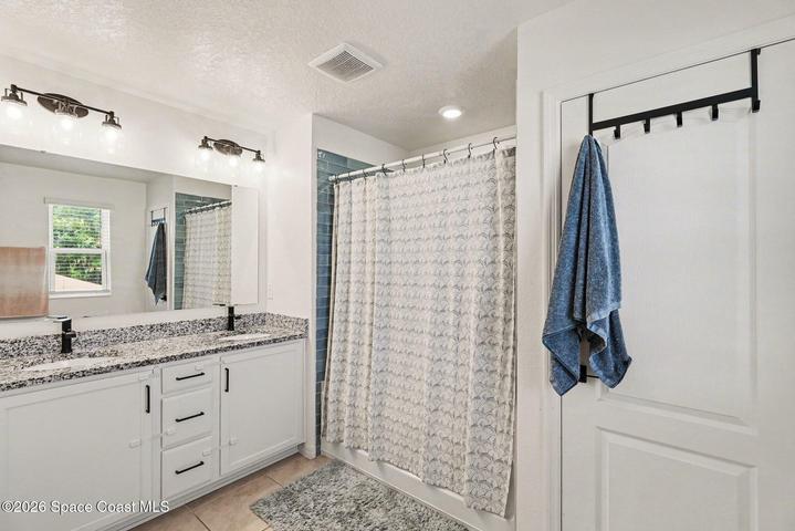 Soaking Tub/Shower with Linen Closet Upgrade. Dual Sinks.