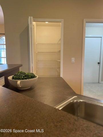 Walk-in pantry and laundry room entrance