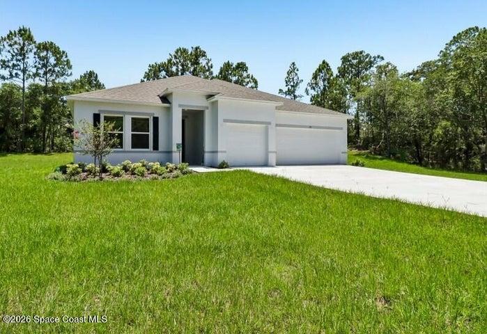 Spacious, landscaped yard, set back on a quiet street