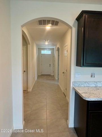 Hallway fro kitchen to front door entry