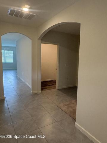 From front entry foyer to Laundry room