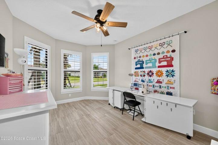 BEDROOM 2 - Opted to upgrade from a Den to a guest bedroom featuring: Bay window expanding living space square footage, In-wall TV mount reinforcement with elevated electrical outlet, closet, Private hallway separating guest bedrooms.