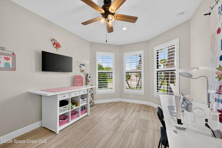 BEDROOM 2 - Opted to upgrade from a Den to a guest bedroom featuring: Bay window expanding living space square footage, In-wall TV mount reinforcement with elevated electrical outlet, closet, Private hallway separating guest bedrooms.