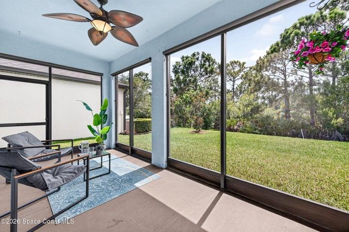 Expansive screened lanai provides breathtaking preserve views