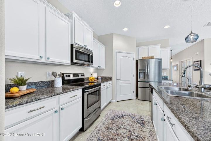 Stainless steel appliances + premium refrigerator featuring versatile middle drawer