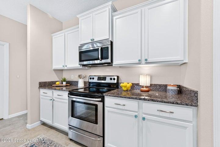 Professionally painted cabinetry provides a fresh finish elevates the entire kitchen!