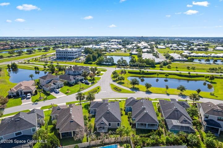 Aerial view showcasing the home’s position within a beautiful community