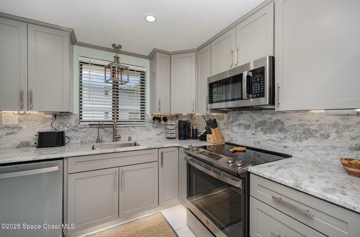 Remodel with granite countertops, new wood cabinets, new appliances