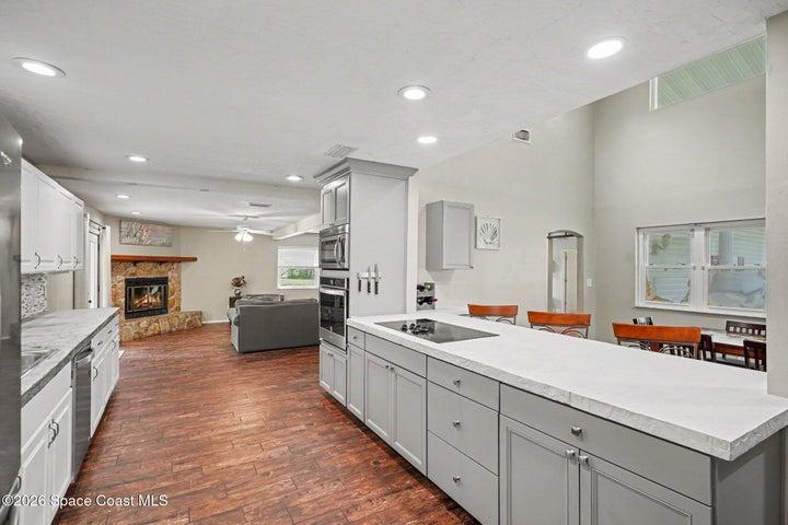 Concrete Counters - Open to Family Room - Decorative fireplace only