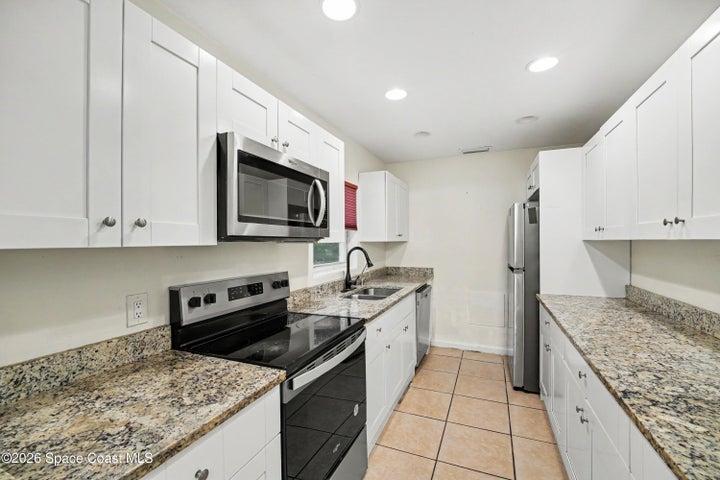 Eat-in Kitchen
Well-appointed kitchen with ample cabinetry and counter space