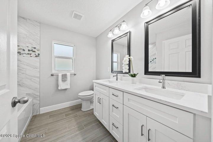 Secondary bath with custom surrounds