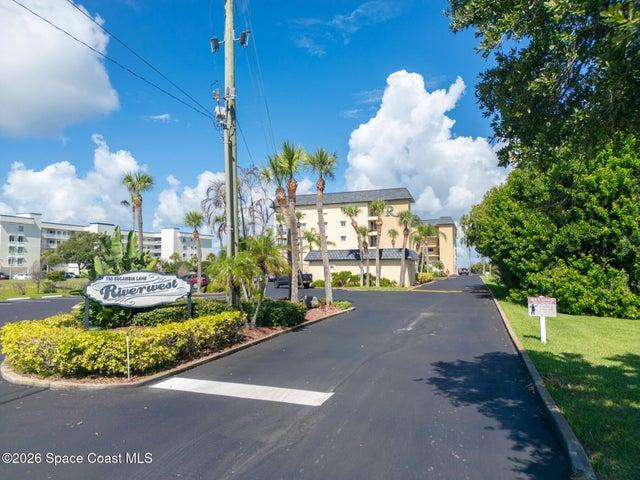 Riverwest condominium entrance sign at 190 Escambia Lane, Cocoa Beach, Florida