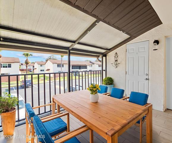 Private screened patio with storage closet