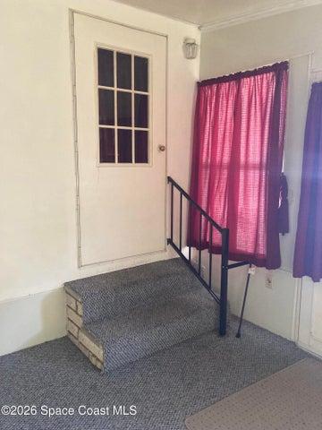 ENTRY TO THE HOME FROM FLORIDA ROOM