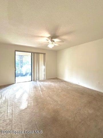 Family Room with Sliders to Screened in Porch!