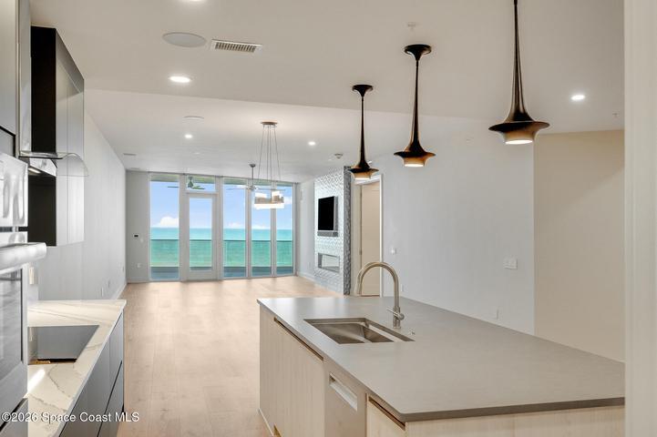 with view to dining area, living room and balcony