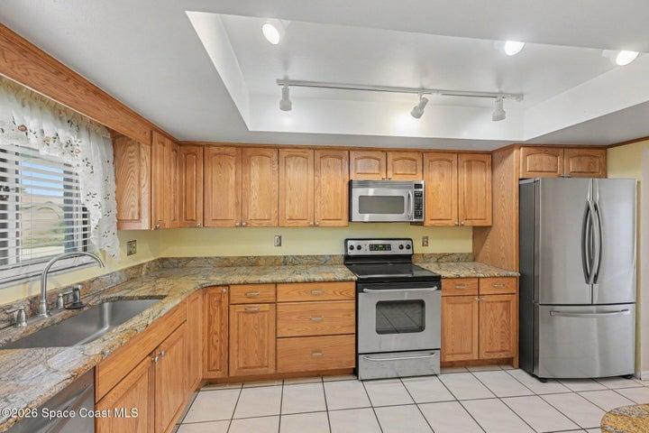 Kitchen with Granite Countertops and Stainless Steel Appiances