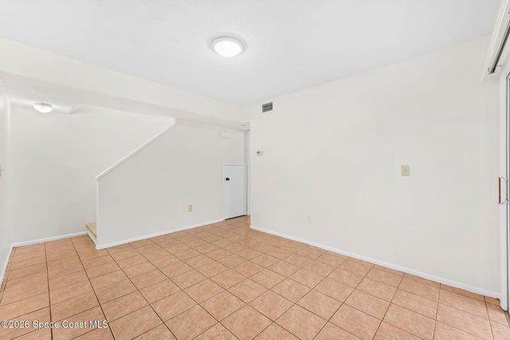 Wait until you see the beautifully updated staircase with Luxury Vinyl Plank behind that wall!