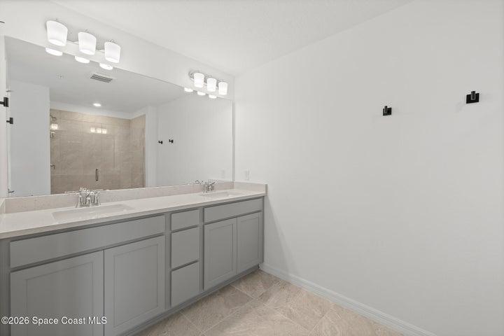 Dual Sinks, Generous Vanity, Ceramic Tile Flooring