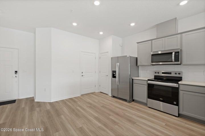 Pantry, LVP Flooring, Open Kitchen