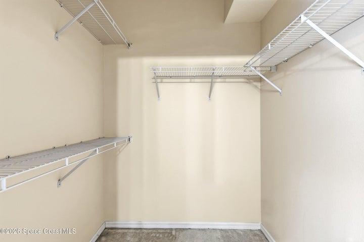 primary walk in closet in bathroom