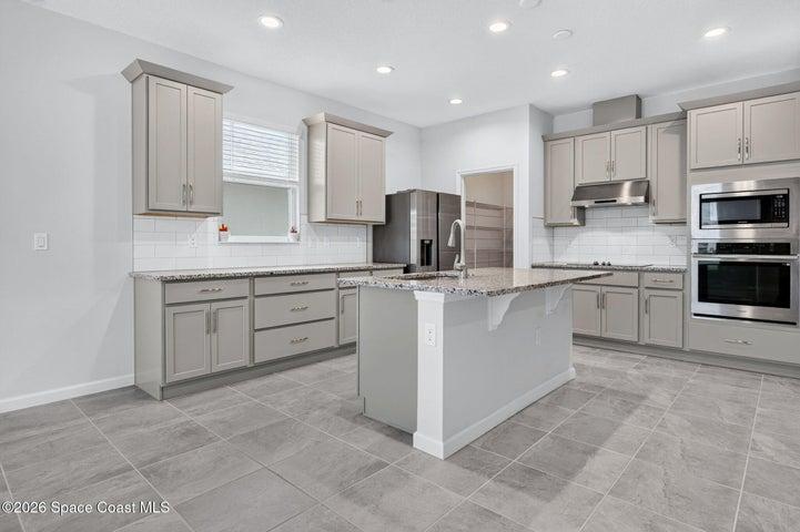 Gourmet kitchen with island seating