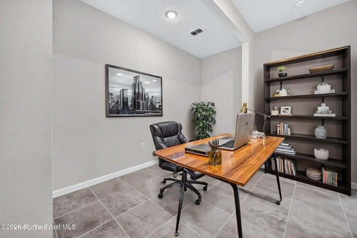 Virtually staged flex room as designated home office