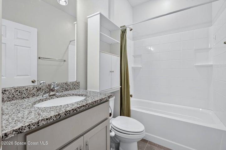 2nd bathroom with tub and shower
