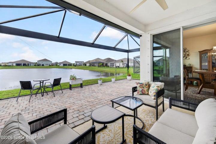 Picture window screened lanai overlooks the lake