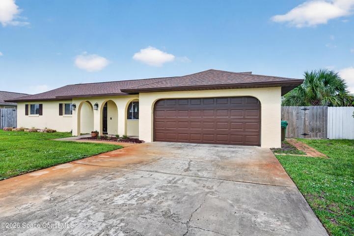 FOUR Bdrms, 2 Baths, 2 Car Garage & Lg Fenced Backyard!