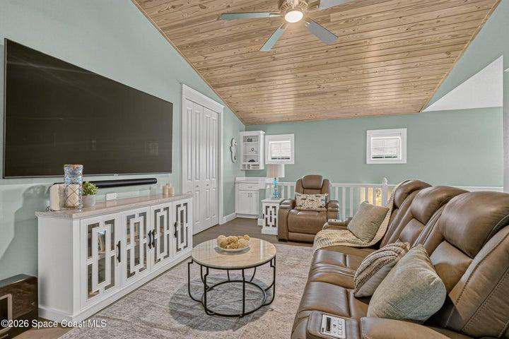 Upstairs Living Area with Ceiling Treatment & Built ins