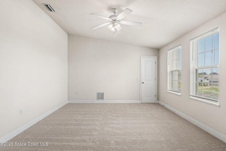 new carpet/ large guest room upstairs (front of home)