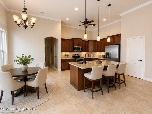 Kitchen with eat-in area overlooking pool