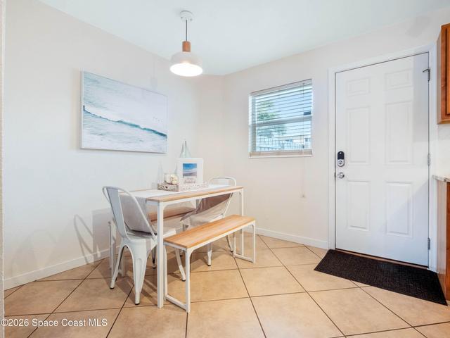 Flexible dining area conveniently located near the kitchen and patio entrance.