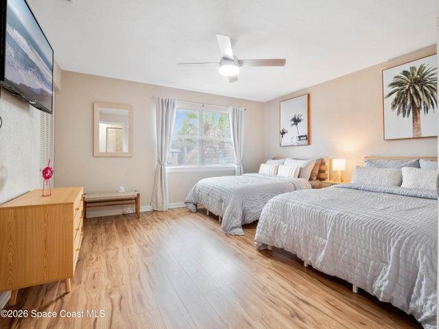 Spacious guest bedroom providing comfortable accommodations for family or visitors.