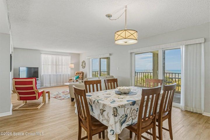 The condo feels BIG. The long run from dining room to living room to balcony is impressive coastal frontage.