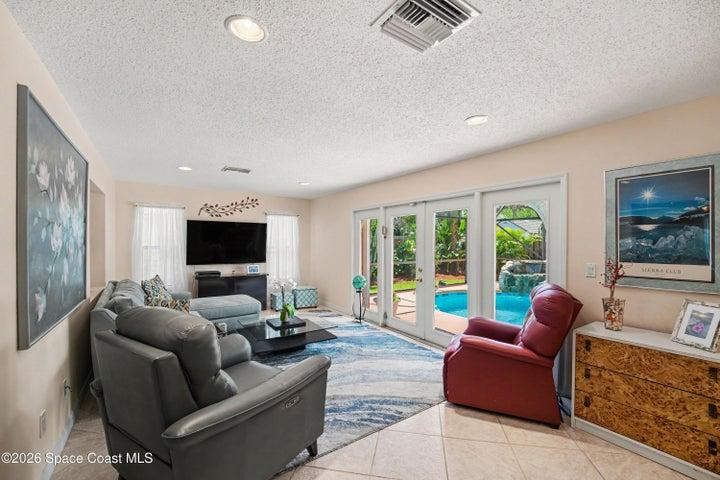 Florida room with French Door access to screened in Pool area.