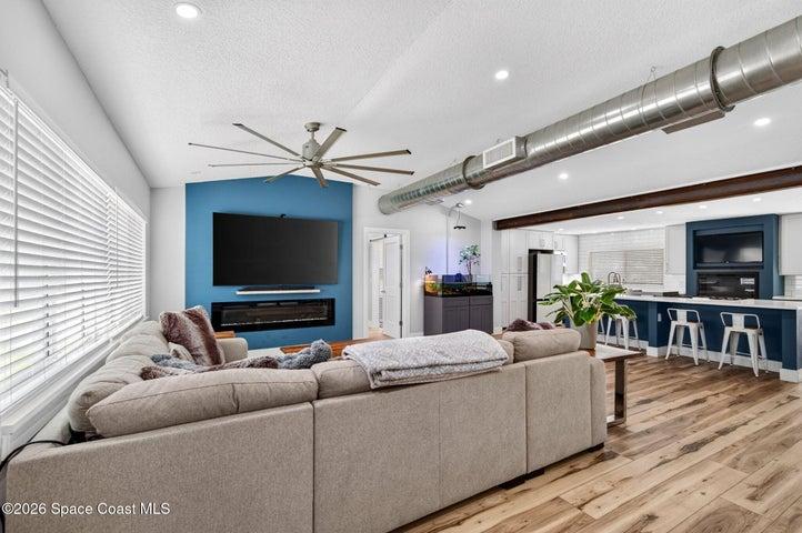 Open-concept living room and kitchen, perfect for entertaining.