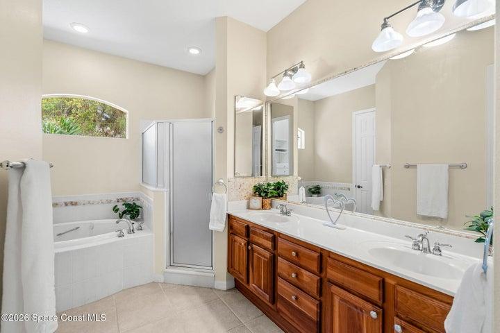Primary Bath with walk in shower and separate jetted tub
