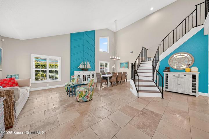 Walking in through the front door.