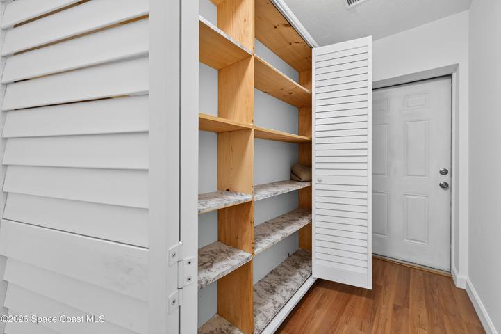 Storage closets in hall to garage