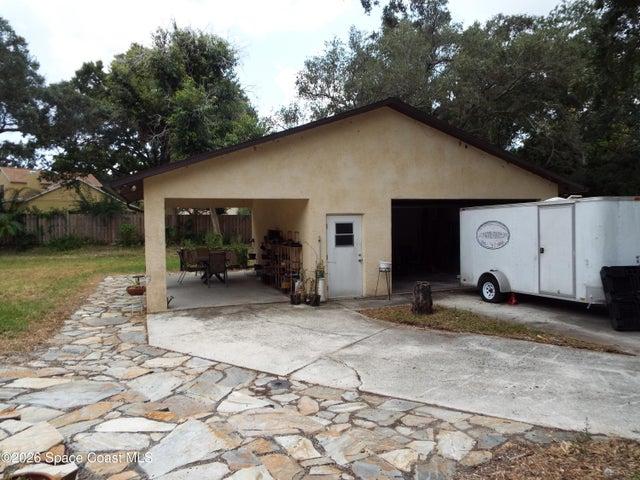 Detached garage and car port