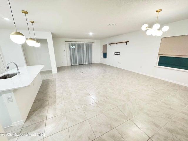 Living room, dining room and kitchen.