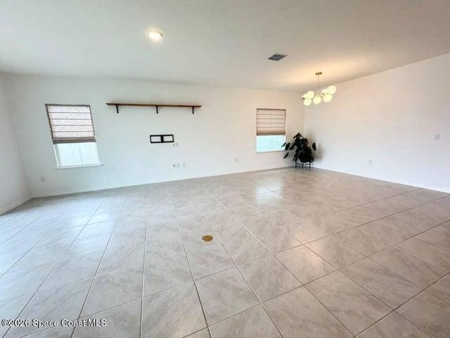 Living room, dining room and kitchen.