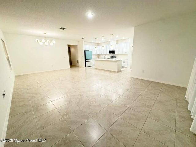 Living room, dining room and kitchen.