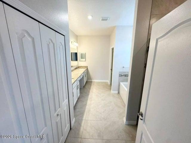 Double sinks, bathtub and shower.