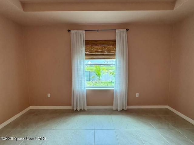 Tiled floors. Window treatments stay.